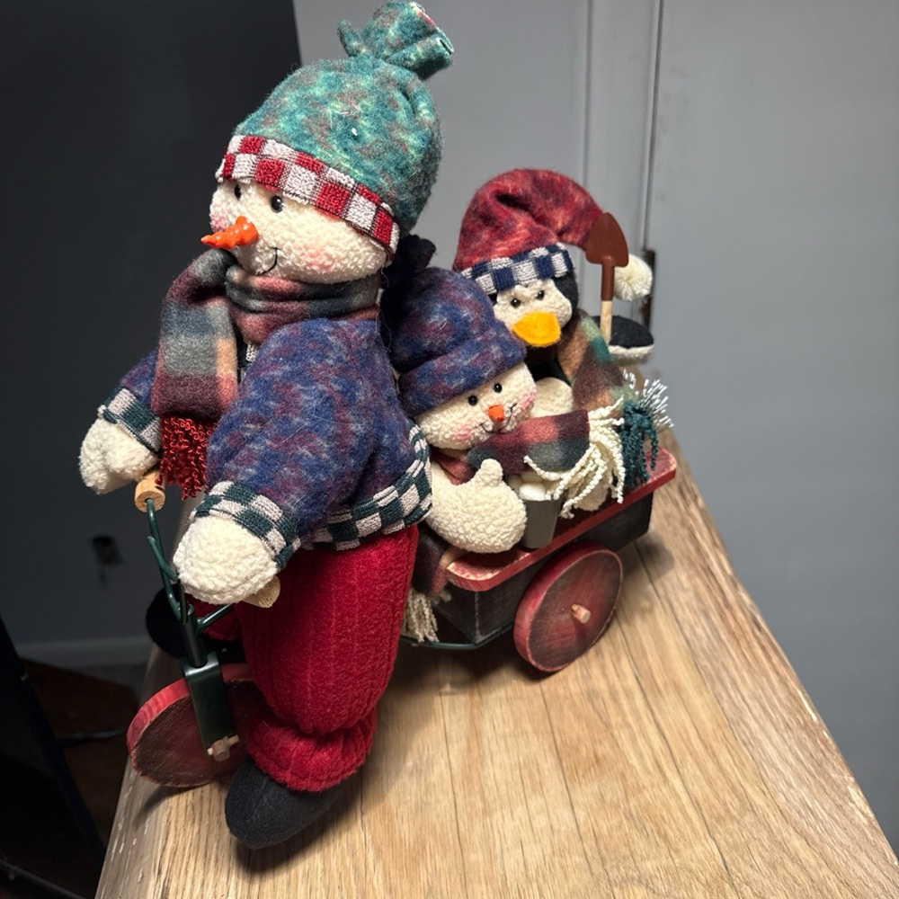 Festive Snowman on Bike Pulling Friends